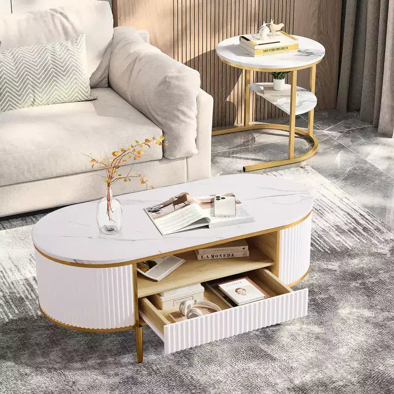 Modern Luxury Fluted Coffee Table, 48 Coffee Table with Storage Drawer, Oval Coffee Table with Golden Legs, Faux Marble Top